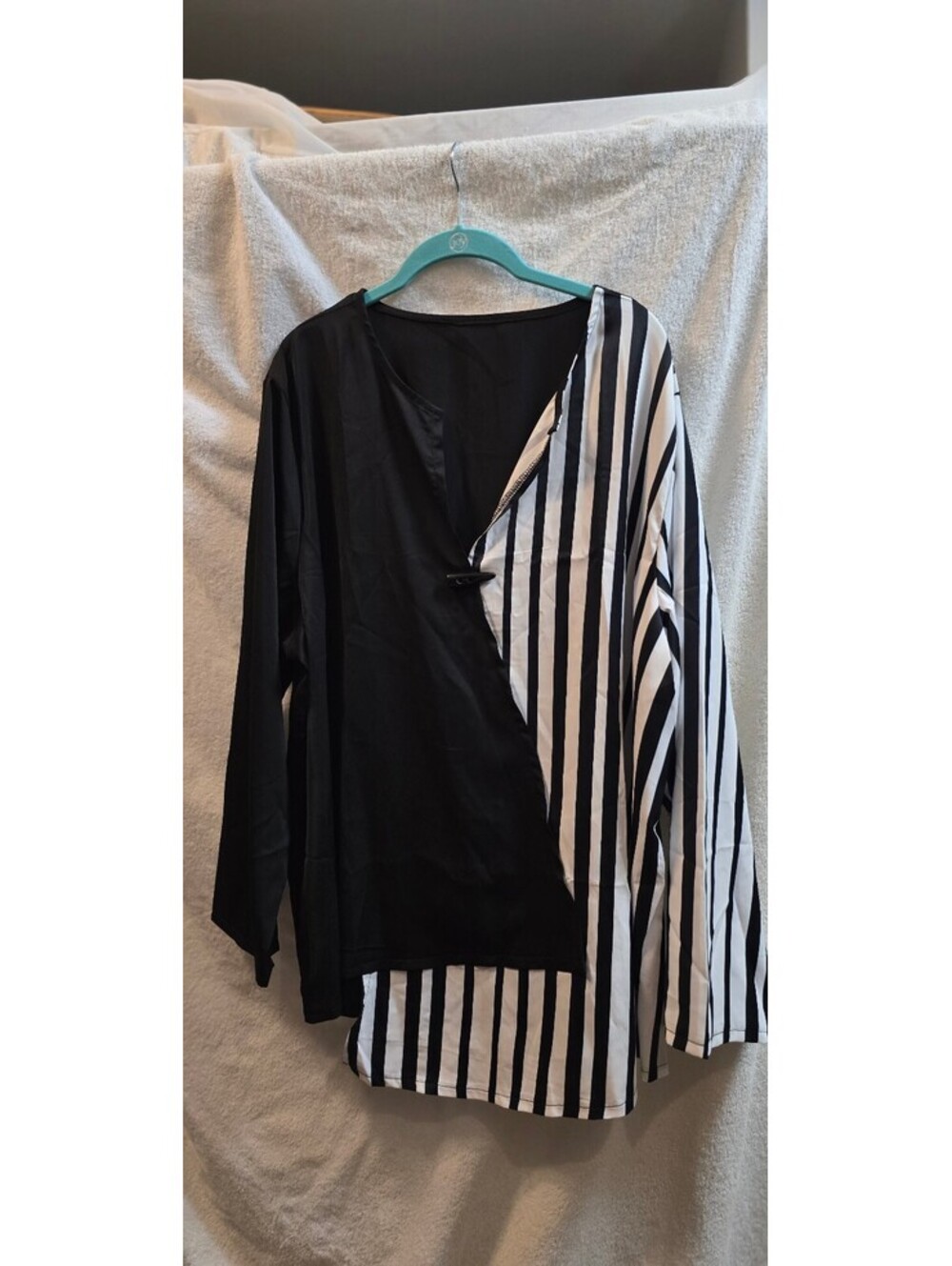 Black and striped asymmetric long sleeve top